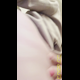 Miss Marilyn pulls grey sweatpants down for a close-up of her ass. No pooping shown. Presented in 720P vertical HD format. About half a minute.